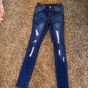 Dark blue ripped jeans
